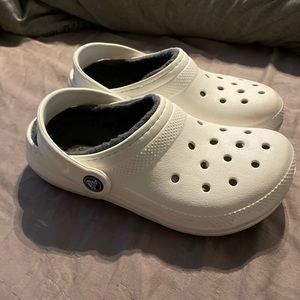 Size 1Y - gently used White crocs with grey fur lining